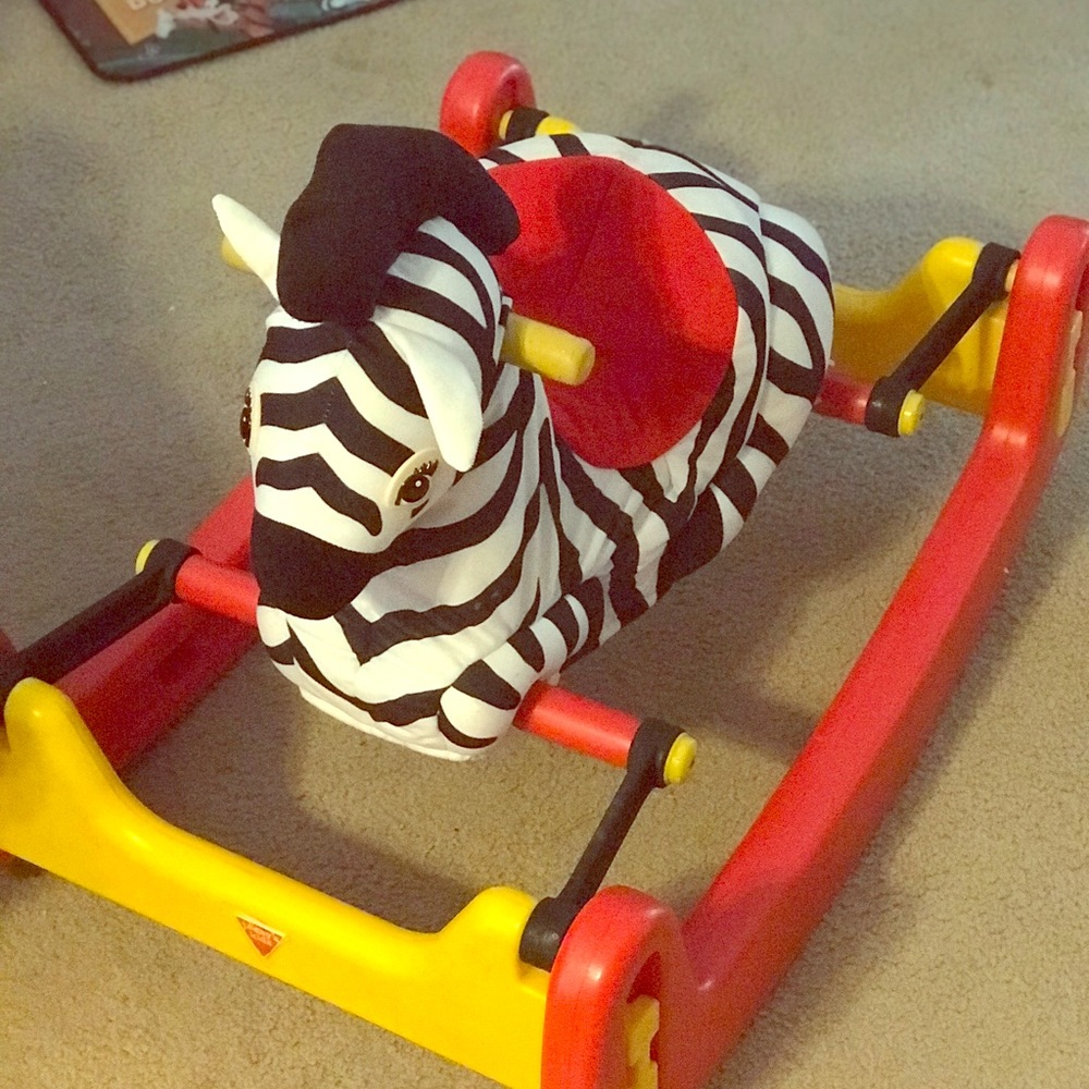 SOLD!!! Sit & ride+ jumping toy zebra!